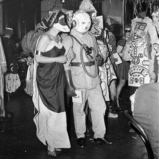 Costumed characters in a festive or theatrical event.