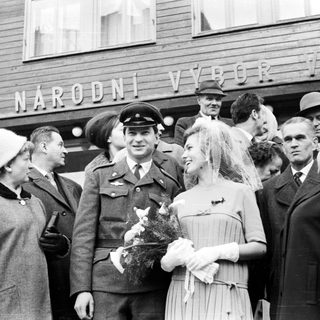 Black and white photo of a military wedding celebration.