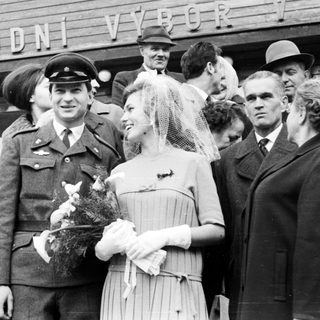 Black and white photo of a military wedding celebration.