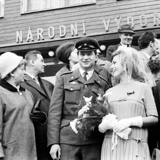 Black and white photo of a military wedding celebration.