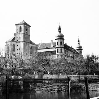 Black and white photo of a large, old building.