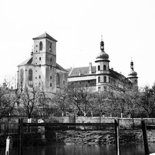Black and white photo of a large, old building.