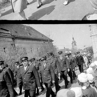 Here are a few brief summaries of what the images show: Image 1: Women in coats walking outside a building. Image