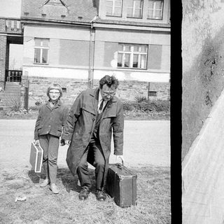 Here are a few brief summaries of the image: Man and child walking, leaving a building. Two images: people leaving