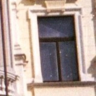 Here's a brief summary of the image: Exterior view of the Slovak National Theatre building.