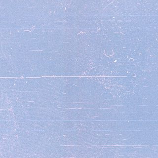 Blue surface with scratches and markings.