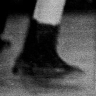 Black and white photo of a wedding reception dance.