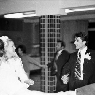 Black and white photo of a bride and groom.