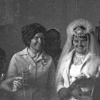 Black and white photo of a couple on their wedding day.