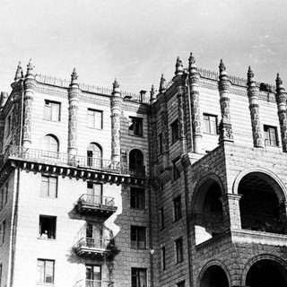 Black and white photo of a gothic-style building facade.