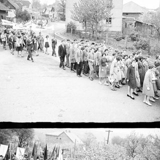 Parade or procession of people along a road.