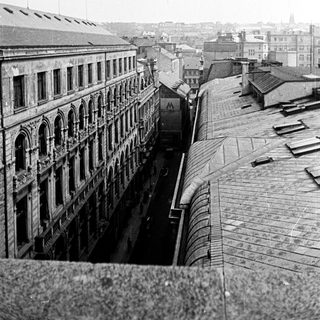 High-angle view of a city street and buildings.