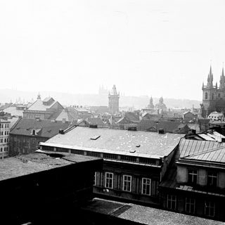 Black and white photograph of a cityscape with church spires.