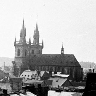 Black and white photograph of a cityscape with church spires.