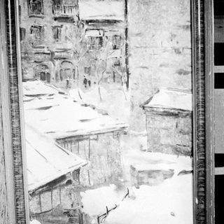 Black and white image of a snow-covered landscape.