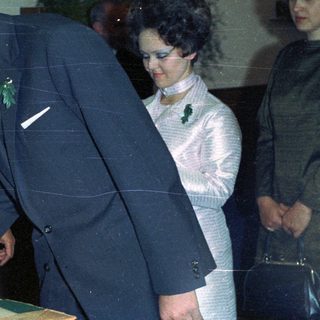 Prince Charles signing a document, likely a marriage certificate.