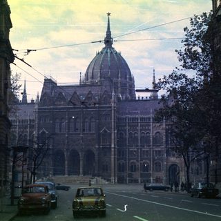 Budapest's Parliament building viewed from a street scene.