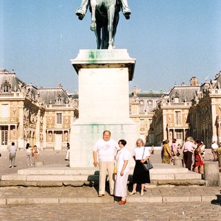 Statue of a rider on horseback in a palace square.