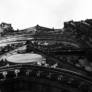 Detailed black and white image of Gothic cathedral architecture.
