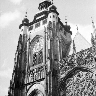 Black and white photo of a historic clock tower.