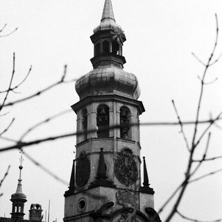 Black and white photo of a clock tower.