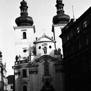 Black and white image of a baroque church facade.