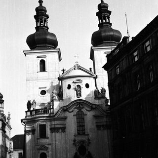 Black and white image of a baroque church facade.