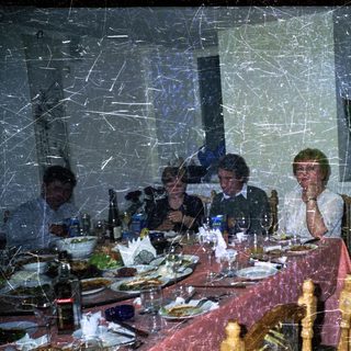 Group seated at a table, appears to be dining.