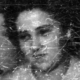 Black and white portrait of a man and woman.