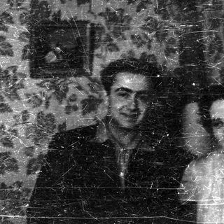 Black and white portrait of a man and woman.