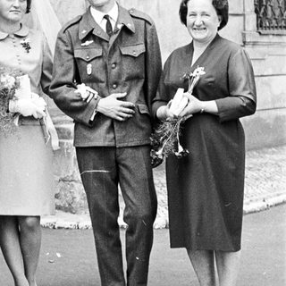 Black and white photo of a wedding party.