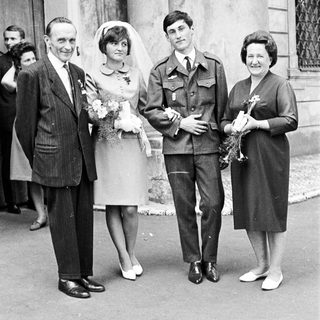 Black and white photo of a wedding party.