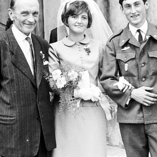 Black and white photo of a wedding party.