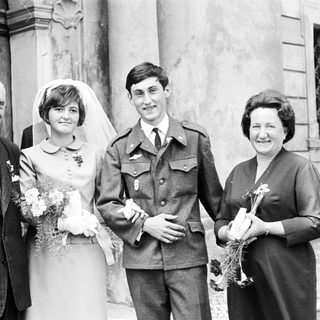 Black and white photo of a wedding party.