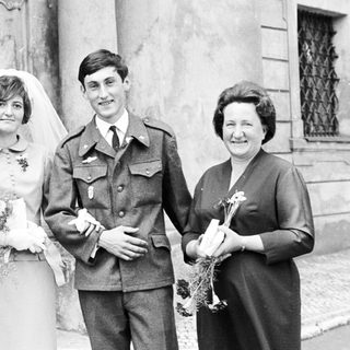 Black and white photo of a wedding party.
