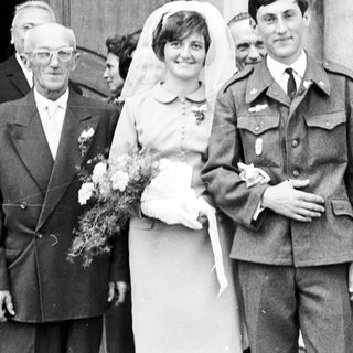 Black and white photo of a wedding party.
