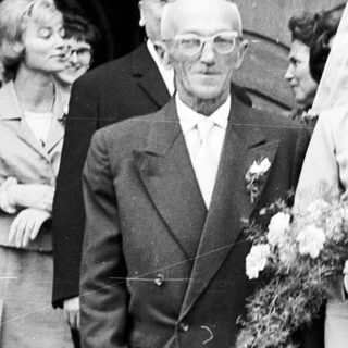 Black and white photo of a wedding party.