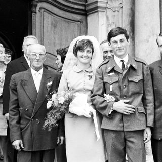 Black and white photo of a wedding party.