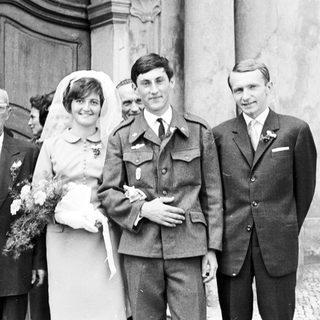 Black and white photo of a wedding party.