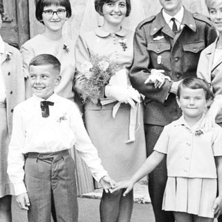 Black and white photo of a wedding party.