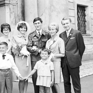 Black and white photo of a wedding party.