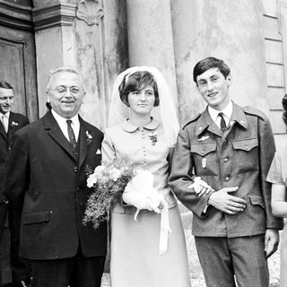 Black and white photo of a wedding party.