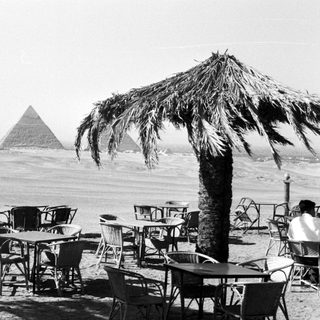 Pyramids viewed from beachside café patio.