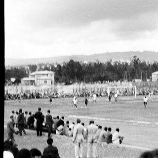Historic soccer match with large crowd.