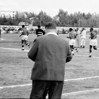 Black-and-white soccer match in progress.