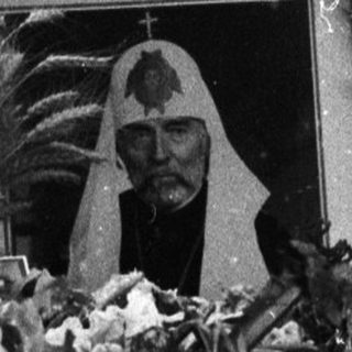 Religious float with statue during procession.