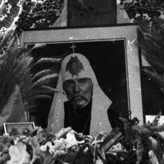 Religious float with statue during procession.