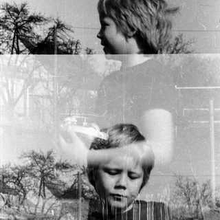 Child outdoors with layered, partially transparent vintage photos.