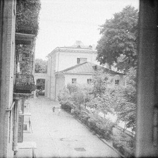 Vintage view of a quiet residential courtyard.