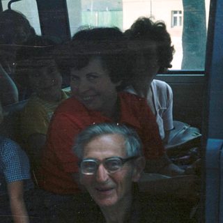 Family group traveling together in a van.